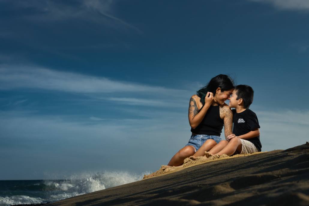 Oahu family portrait photographers like to capture memories at sunset. Ryan Sakamoto is one of the best Hawaii family photographers Oahu has to offer.