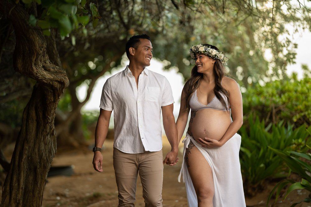 First time parents to be Jenn & Edric on a maternity photo shoot at Kahala Beach Park