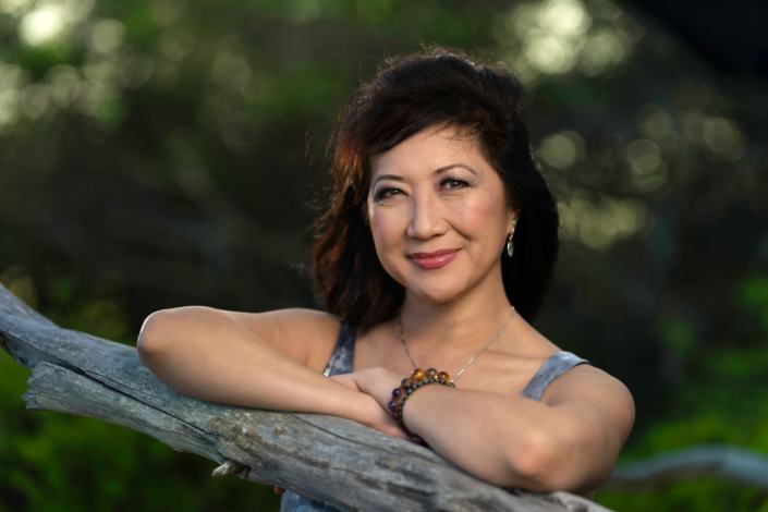 Environmental portrait headshot at sunrise on a beach near Hawaii Kai.