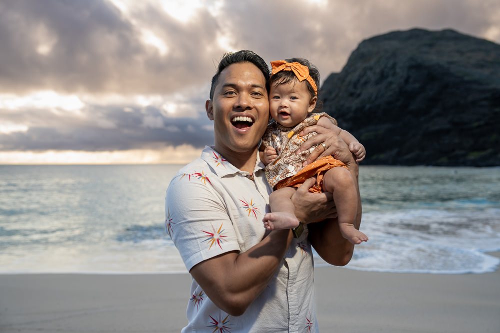 Sunrise family portrait on Oahu at Makapuu Beach Park.